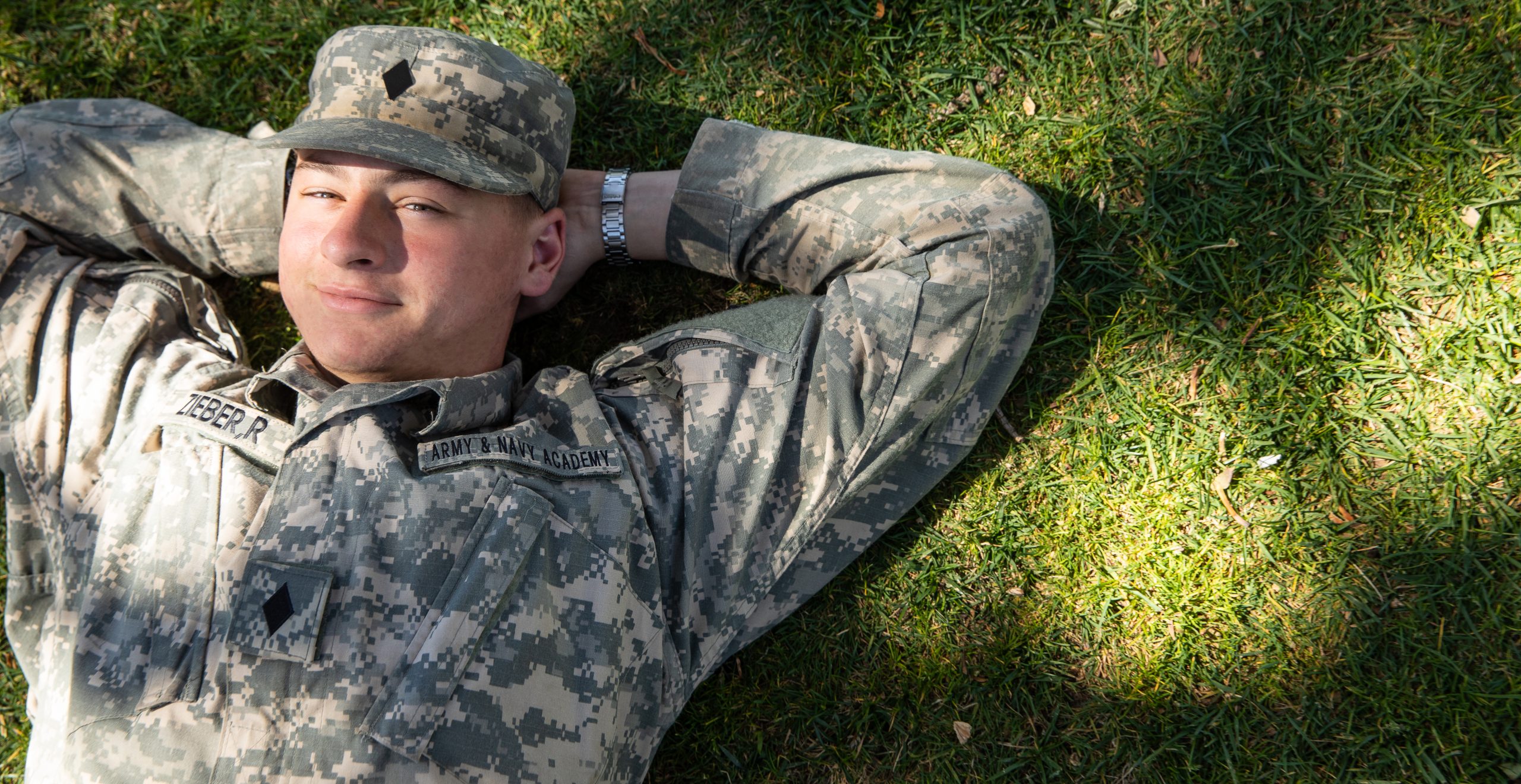 Cadet Relaxing on Grass